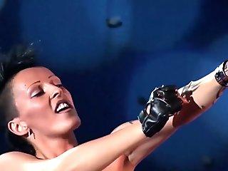 extreme fetish show on public show stage