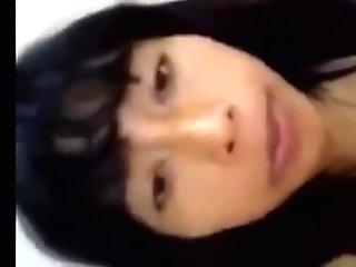 WIndonesian teen masturbates with a eggplant